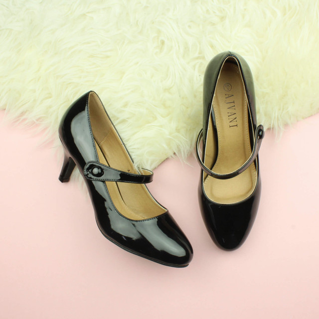 Closeup view of features of Black Patent Mid Heel Mary Jane Court Shoes