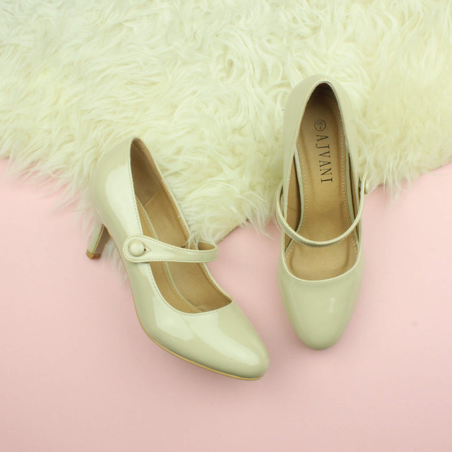 Closeup view of features of Nude Patent Mid Heel Mary Jane Court Shoes
