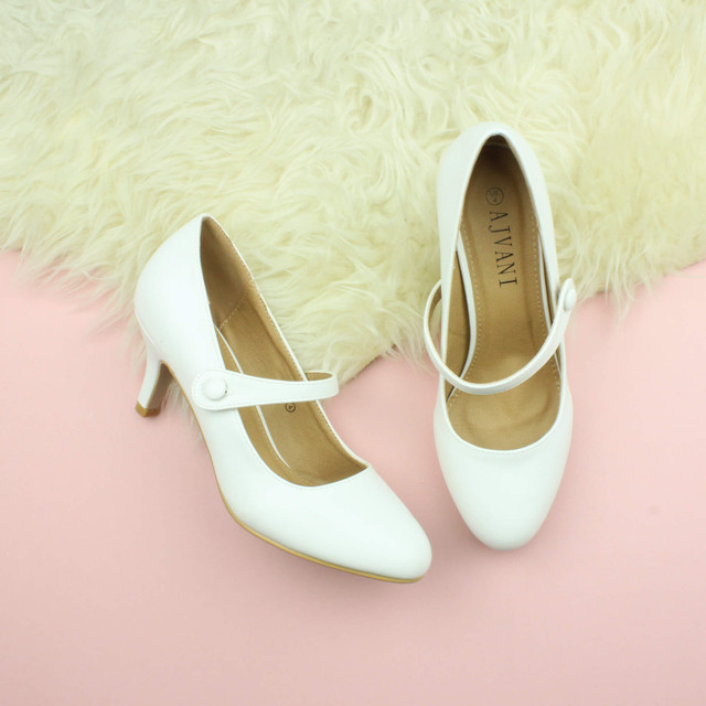 Closeup view of features of White PU Mid Heel Mary Jane Court Shoes