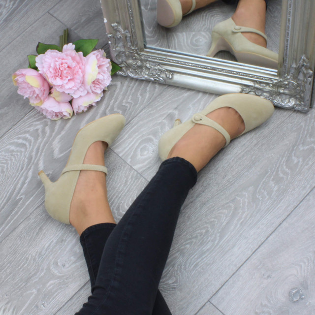 Model wearing Nude Suede Mid Heel Mary Jane Court Shoes