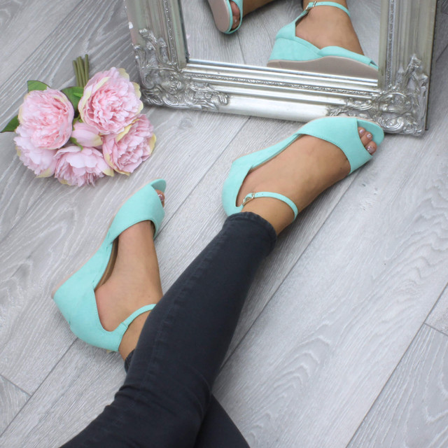 Model wearing Mint Suede Low Mid Wedge Heel Ankle Strap Sandals