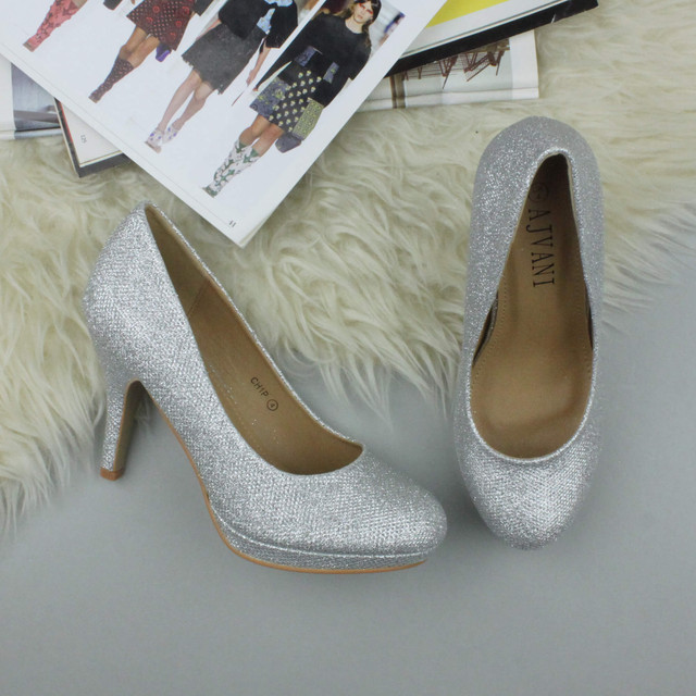 Closeup view of features of Silver Glitter High Heel Platform Court Shoes