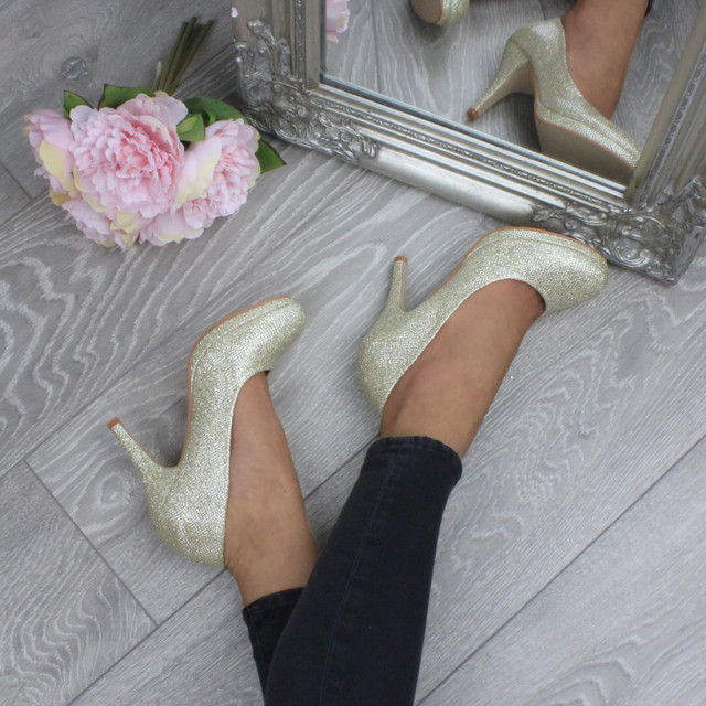 Model wearing Gold Glitter High Heel Platform Court Shoes