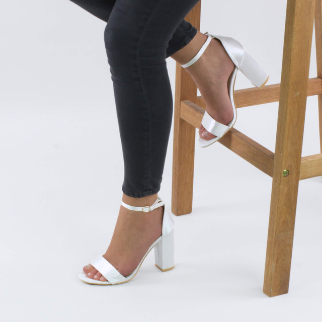 Model wearing White Satin High Block Heel Ankle Strap Sandals
