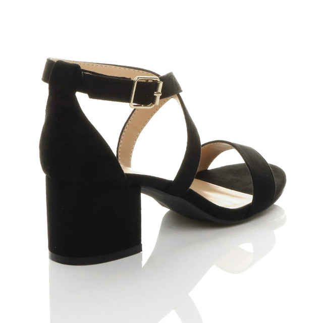 Back right side view of Black Suede Mid Block Heel Cross Strap Party Strappy Sandals