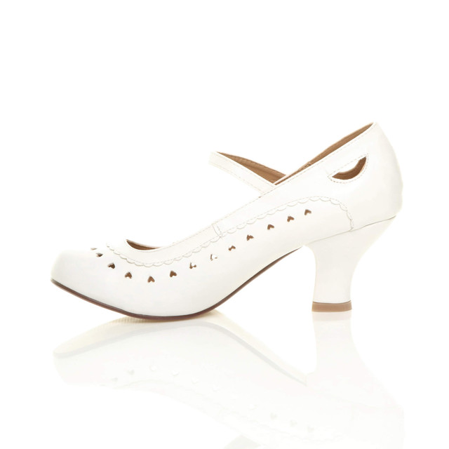 Left side view of White PU Mid Heel Mary Jane Heart Cut Out Court Shoes