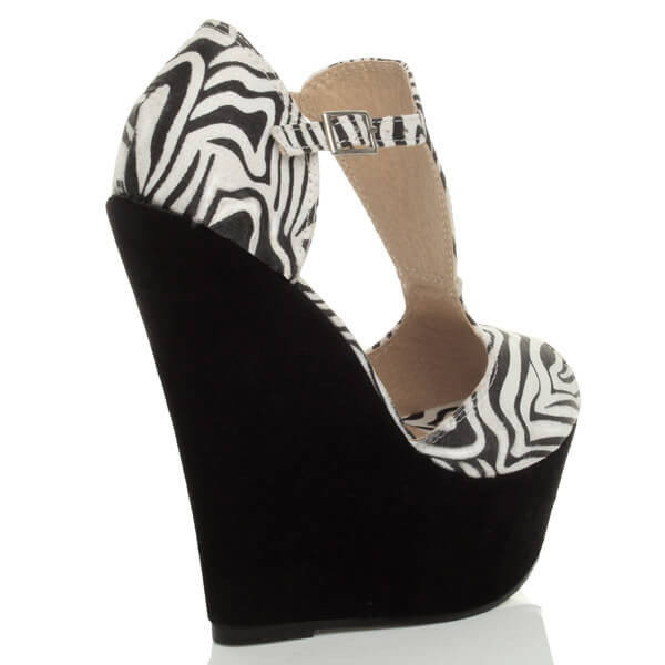 Back right side view of Zebra Suede High Heel Wedge T-Bar Buckle Platform Sandals