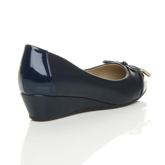 Back right side view of Navy PU Low Mid Wedge Bow Court Shoes