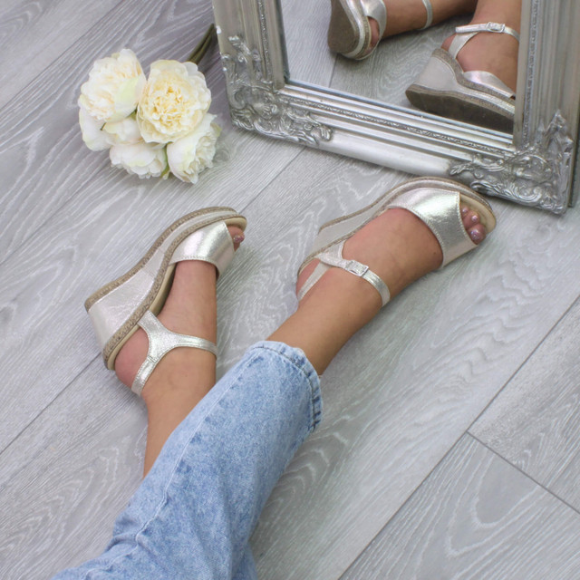 Model wearing Gold Shimmer PU High Wedge Heel Cork Platform Buckle Sandals