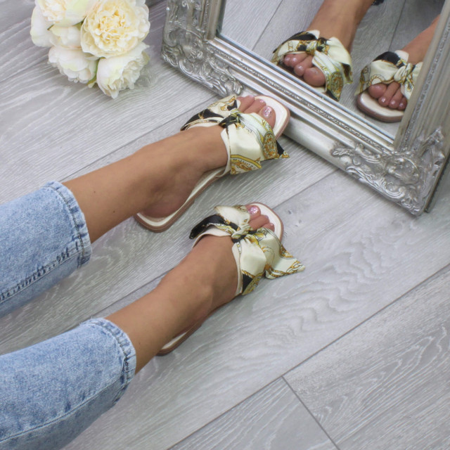 Model wearing Beige Flat Slip On Mule Boho Printed Bow Sandals Flip Flops