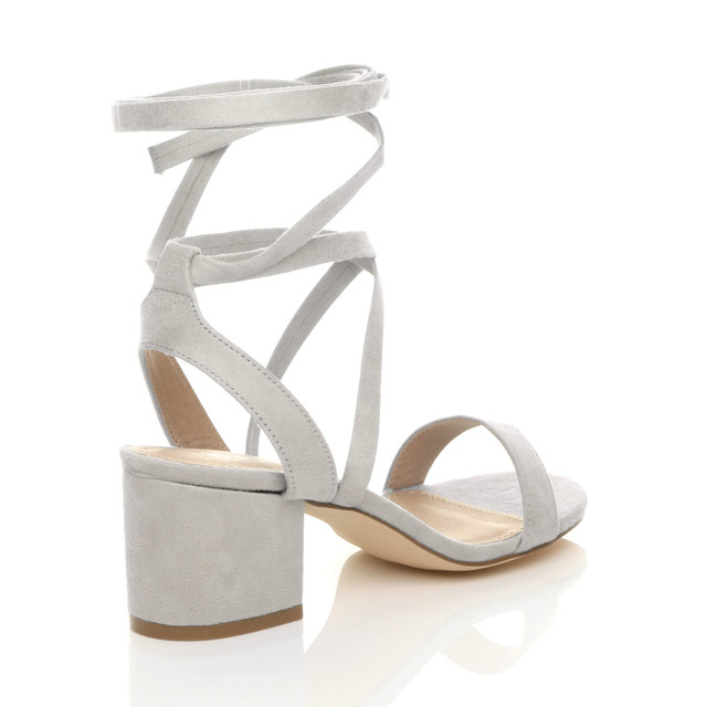 Back right side view of Grey Suede Low Mid Block Heel Lace Up Ankle Tie Wrap Strappy Sandals