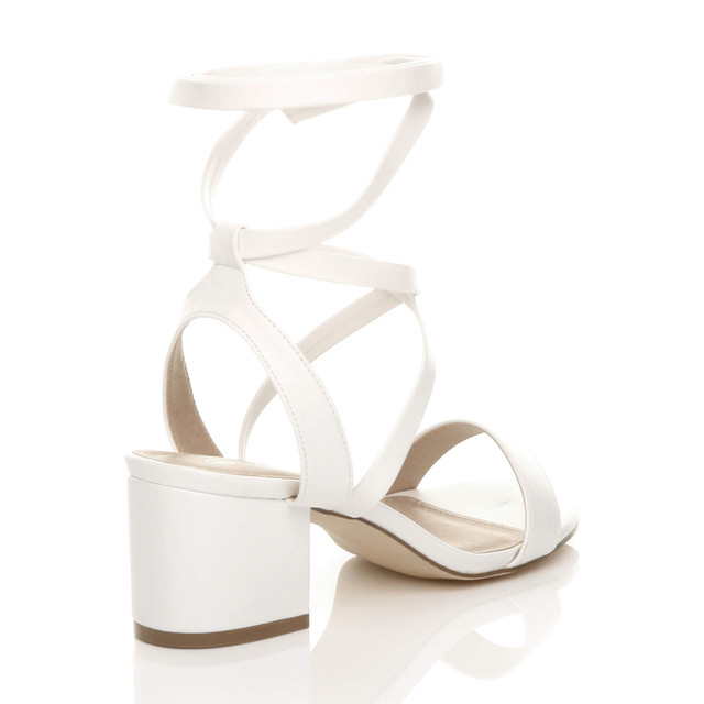 Back right side view of White PU Low Mid Block Heel Lace Up Ankle Tie Wrap Strappy Sandals