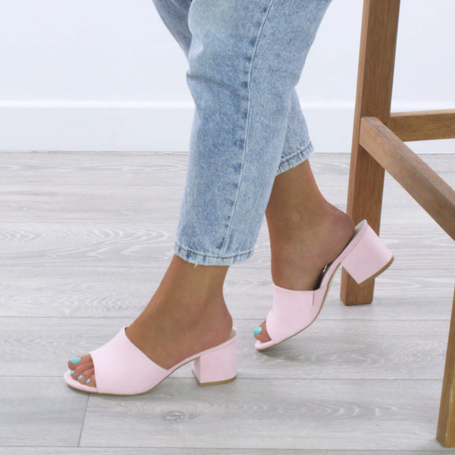 Model wearing Pale Pink Suede Low Mid Block Heel Casual Party Evening Mules Sandals 