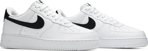 The Nike Air Force 1 ‘07 ‘White Black’ presents an elemental colorway of the iconic silhouette. The upper is constructed from tumbled white leather, contrasted by a black Swoosh and a matching black heel tab marked with classic Nike Air branding. The low-top is supported by a rubber cupsole, which houses foam cushioning enhanced with a Nike Air unit in the heel. Underfoot, the signature pivot point outsole is a reminder of the shoe’s hardwood roots.