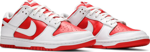 The Nike Dunk Low 'Championship Red' features simple two-tone color blocking in keeping with the shoe’s introductory ‘Be True to Your School’ series from 1985. The leather upper pairs a crimson base with contrasting white overlays at the forefoot and heel. Standard Nike branding makes its way to the insole, heel tab and woven tongue tag. The sneaker rides on a traditional rubber cupsole, highlighted by white sidewalls and a grippy red rubber outsole.