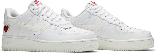 In preparation for February 14, the Nike Air Force 1 Low ‘Valentine’s Day’ places a Swoosh-embossed red heart on the lateral heel of the clean white leather upper. Additional crimson pops of color land on the sockliner and standard Nike branding hits at the heel tab and woven tongue tag. A subtle cream hue distinguishes the signature Swoosh and durable rubber cupsole, featuring encapsulated Nike Air cushioning in the heel and a pivot-point traction pattern underfoot.