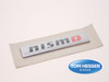 99993-RN201 NISMO BRUSHED BADGE EMBLEM FRONT