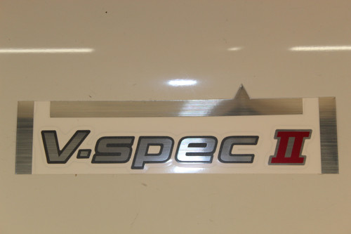 84896-AB000 V-SPEC II EMBLEM REAR NISSAN SKYLINE R34 GT-R