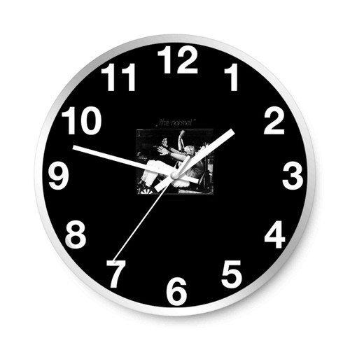The Normal Tvod Warm Leatherette Wall Clocks
