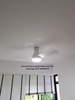 KDK U48FP white ceiling fan in condo bedroom