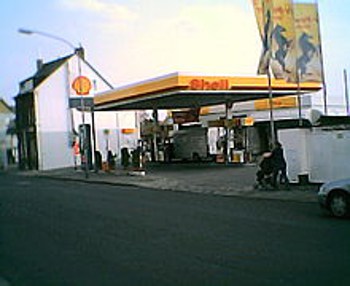A Filling Station with Several Grades of Gasoline and Diesel, and 20 Lb Propane Tanks