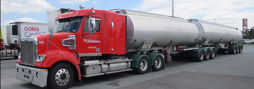 A Double Trailer Tanker Truck for Large Fuel Deliveries to Oil Companies and Fuel Depots