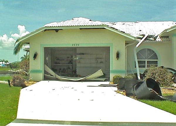 Garage door damaged by a hurricane