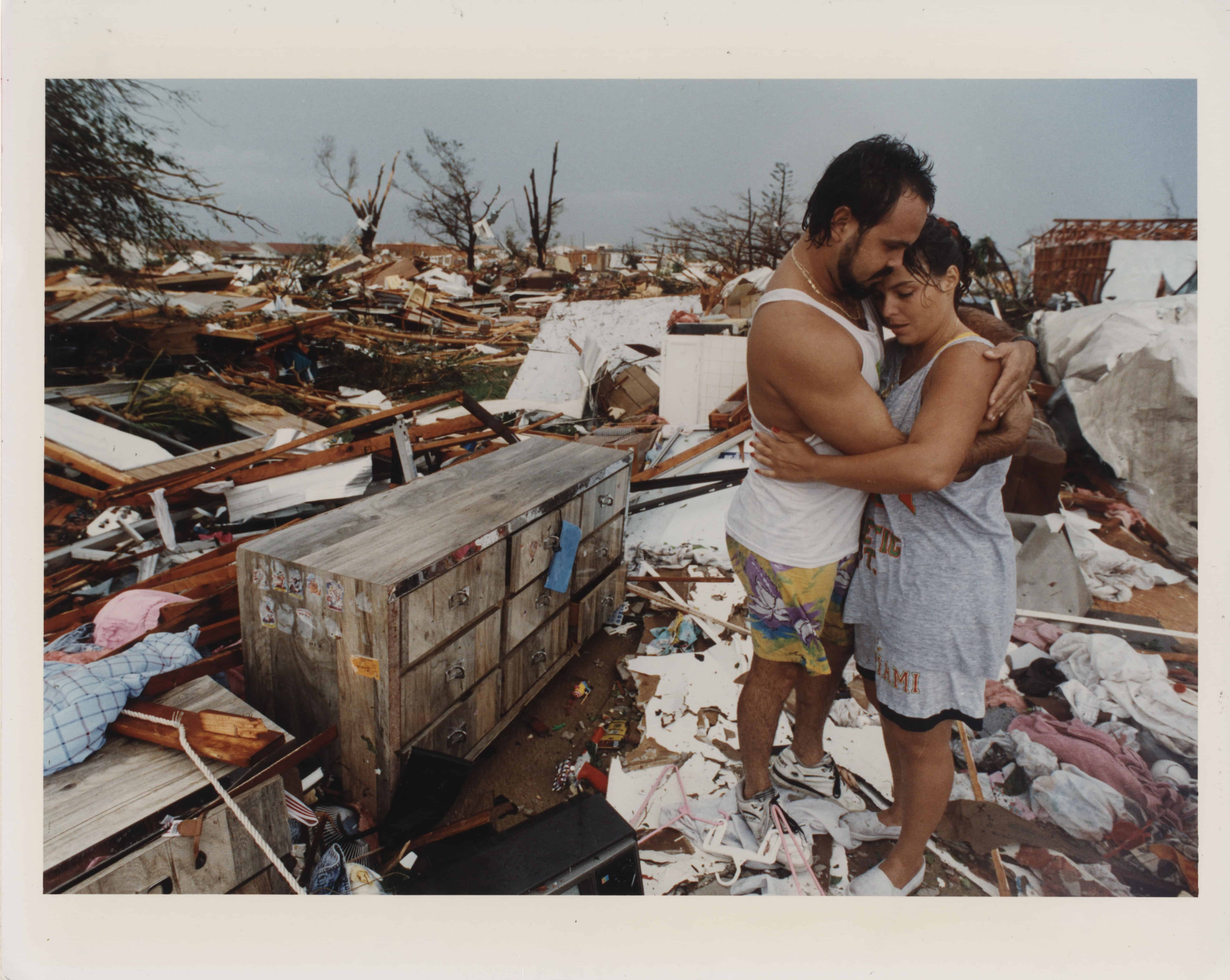 A couple admist the wreckage that was once their home after Hurricane Andrew