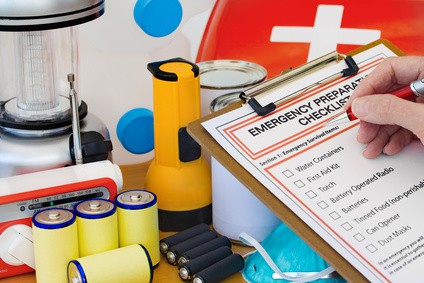 Comparing an Winter Emergency Kit for Home against a checklist of necessary items.