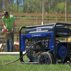 A Carpenter Cuts Wood with a Saw Powered by a Westinghouse WGen7500 Electric Start Portable Generator