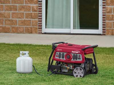 Powermate Dual Fuel Portable Generator Running on Propane Outside Home