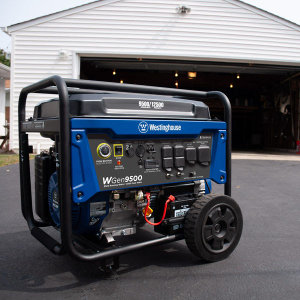 A Westinghouse WGen9500 Electric Start Portable Generator on a Driveway Ready for Use