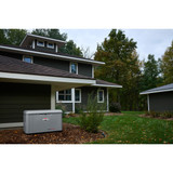 The Briggs and Stratton 17kW PowerProtect Whole House Standby Generator installed in a home's backyard.