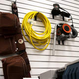 DuroMax 50 ft 10 Gauge Extension Cord Hanging in a Home Workshop