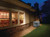 Home at night during an outage powered by a 20kW Briggs and Stratton Home Standby Generator 40645 with 100-amp ATS