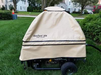 GenTent 10K Tan Stormbracer Portable Generator Canopy on a Portable in Neighborhood Front Yard