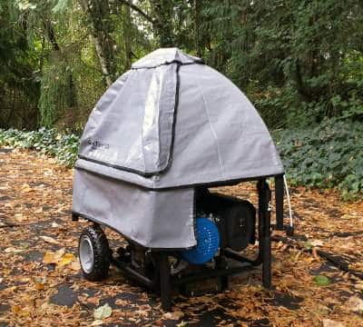 GenTent 10K Stormbracer Standard Grey Portable Generator Tent on a Driveway Portable During a Storm