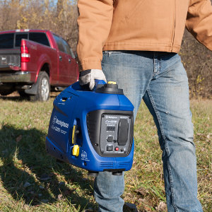 Man Carrying the Westinghouse iGen1200 Inverter Generator