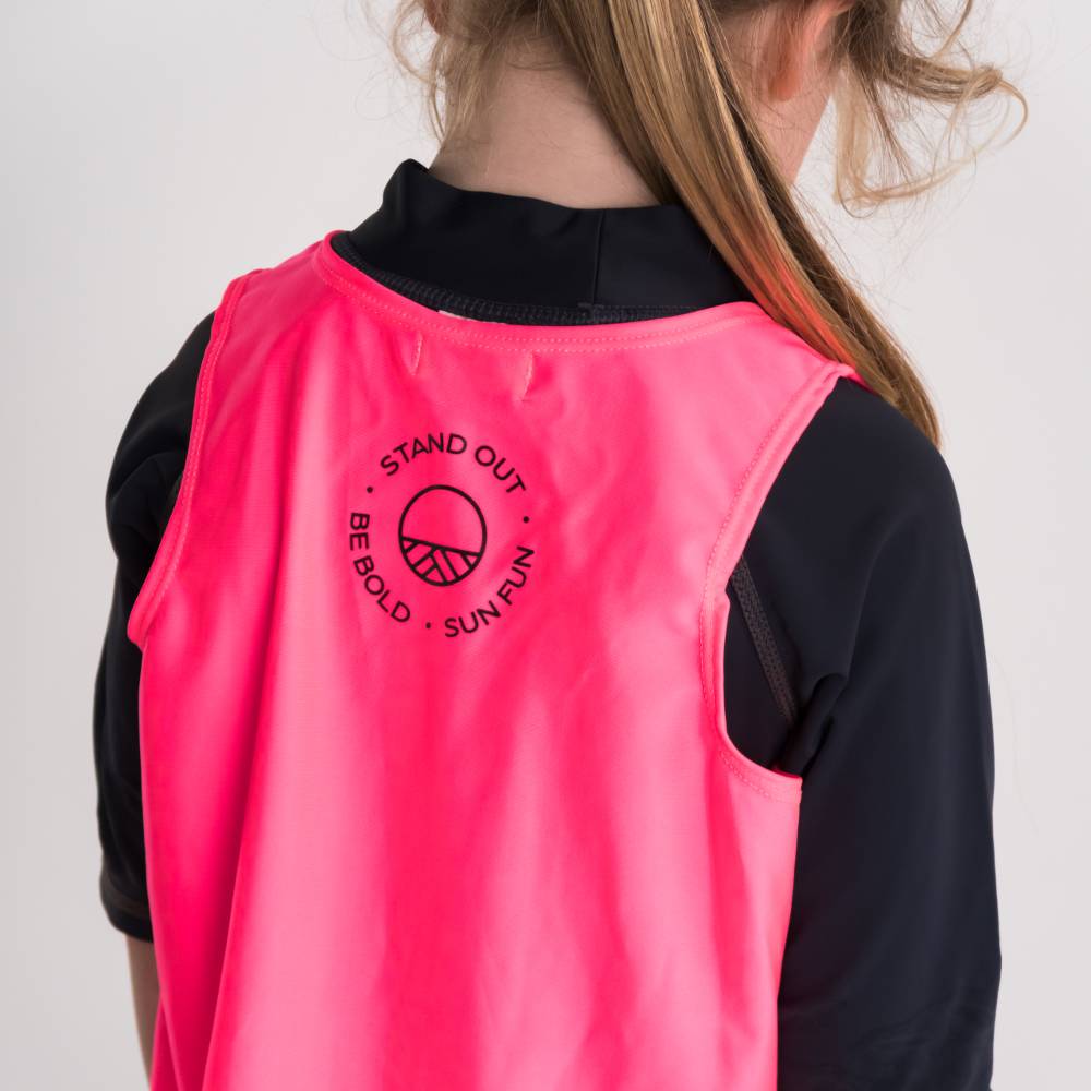 Girl in Neon Pink Over Vest, back shot, close up