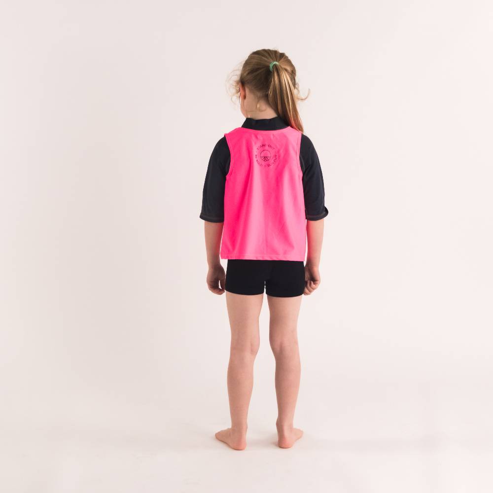 Girl in Neon Pink Over Vest, back shot