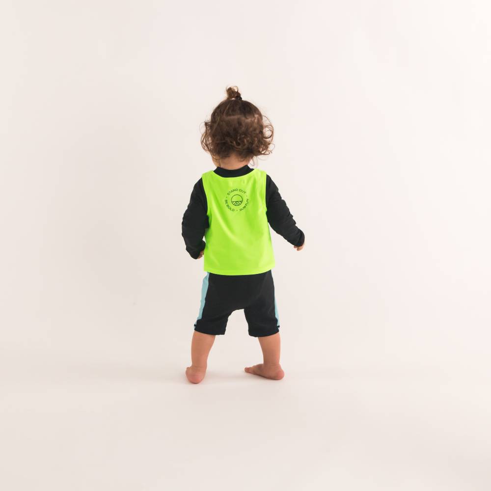 Toddler in Neon Green Over Vest, back shot
