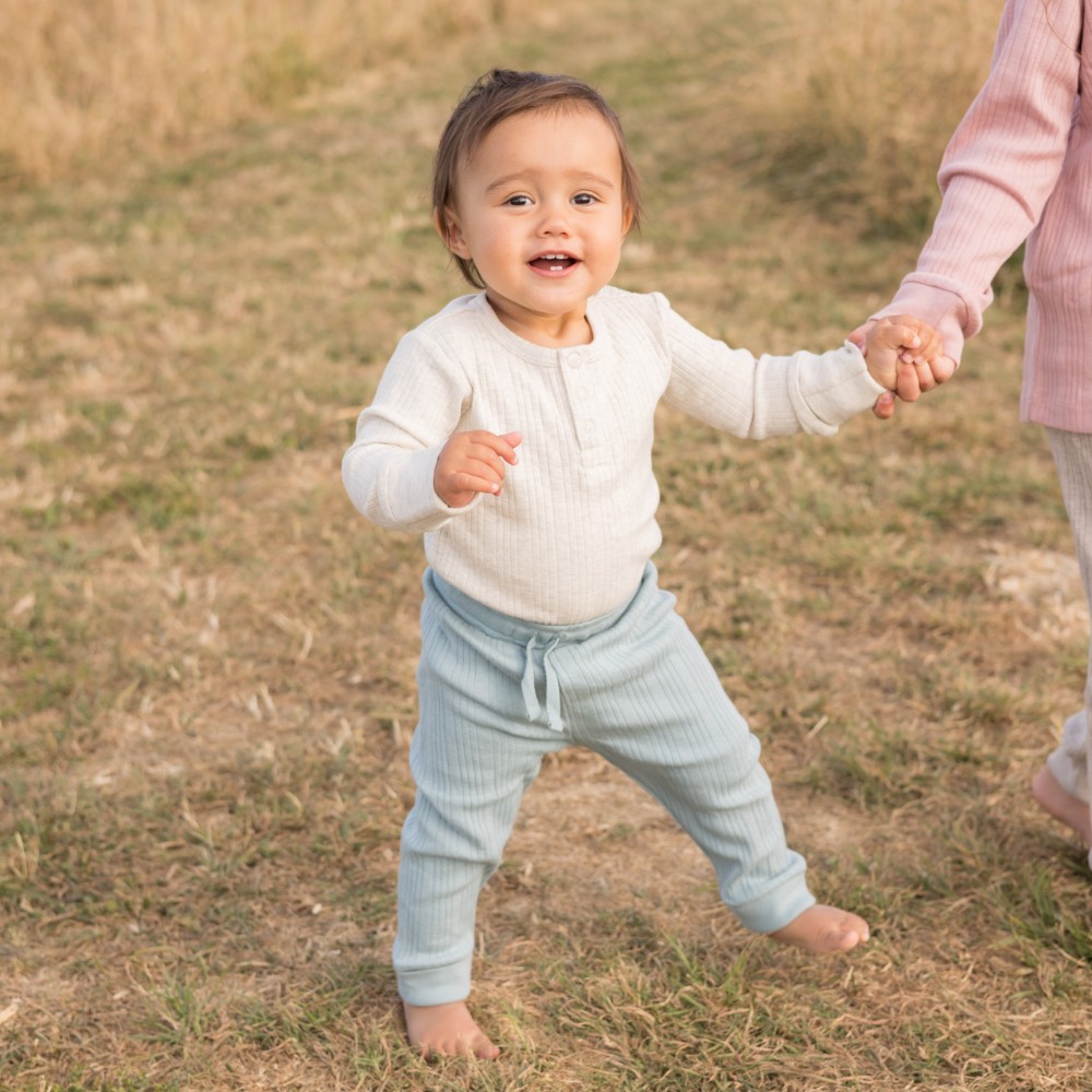 Woolbabe Organic Cotton/Merino Long Sleeve Henley Bodysuit - Natural Marl