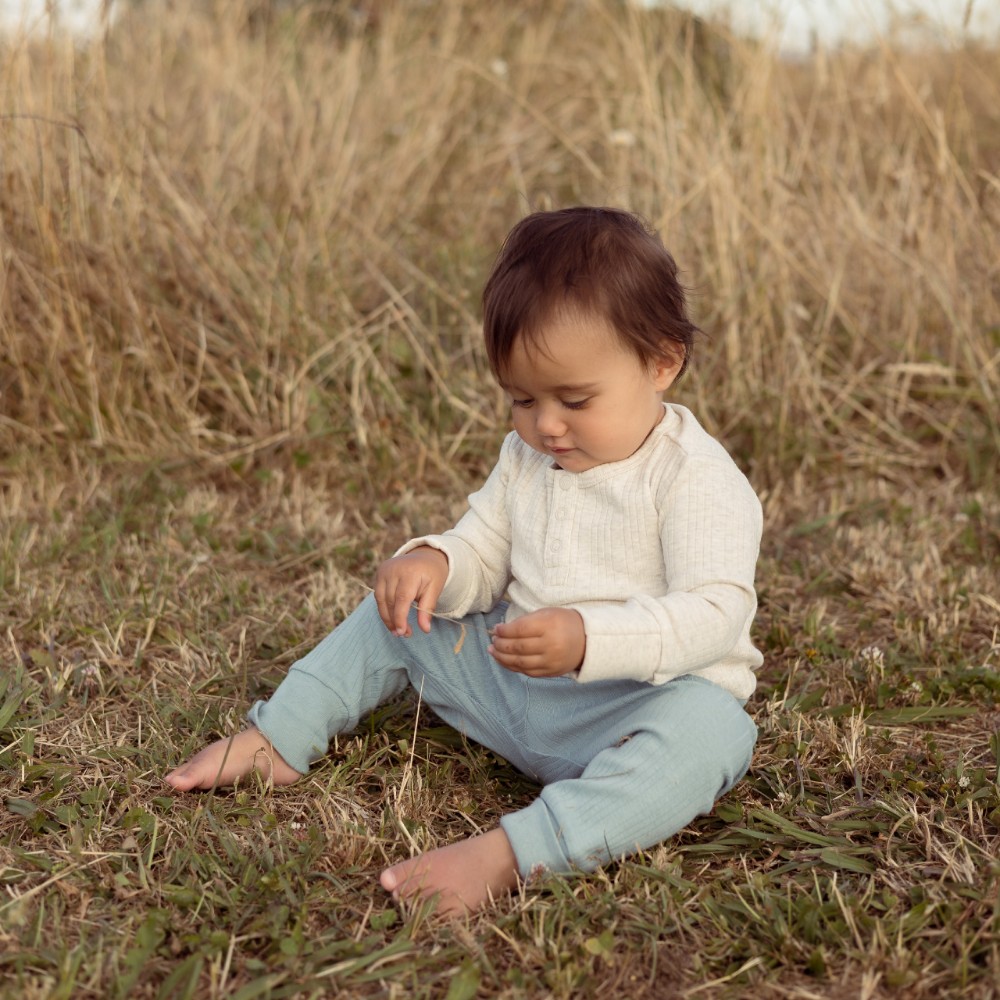 Woolbabe Organic Cotton/Merino Long Sleeve Henley Bodysuit - Natural Marl