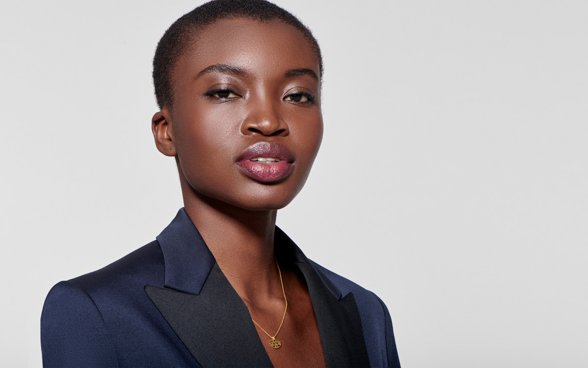 Woman model wearing 22 karat gold necklace 