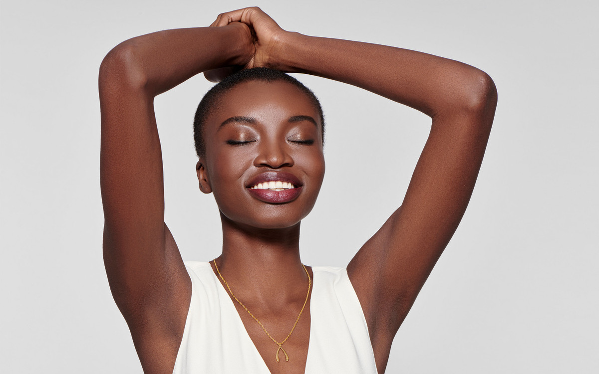Woman model wearing 22 karat gold necklace 