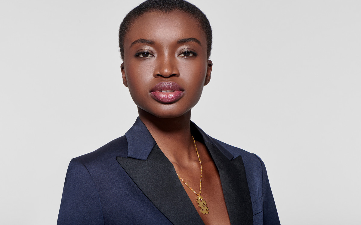 Woman model wearing 22 karat gold necklace 