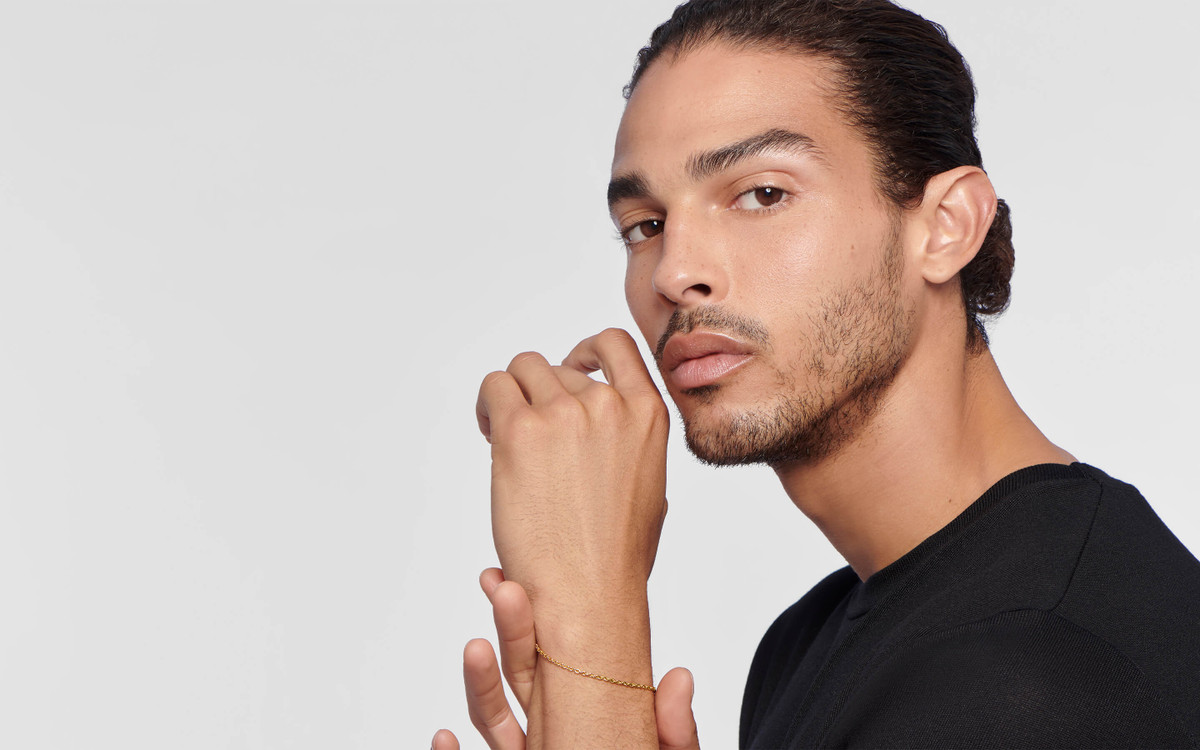 Male model wearing 22 karat gold bracelet