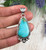 Navajo handmade aqua blue Royston Turquoise Pendant by Leland Yazzie.