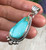 Classic style handmade Sterling Silver and Royston Turquoise Pendant by Leland Yazzie.