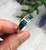 Handmade sterling silver band ring with inlaid turquoise and coral